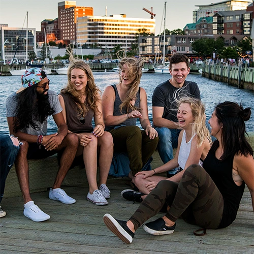 This is an image of a few young people enjoying at the Halifax Harbourfront